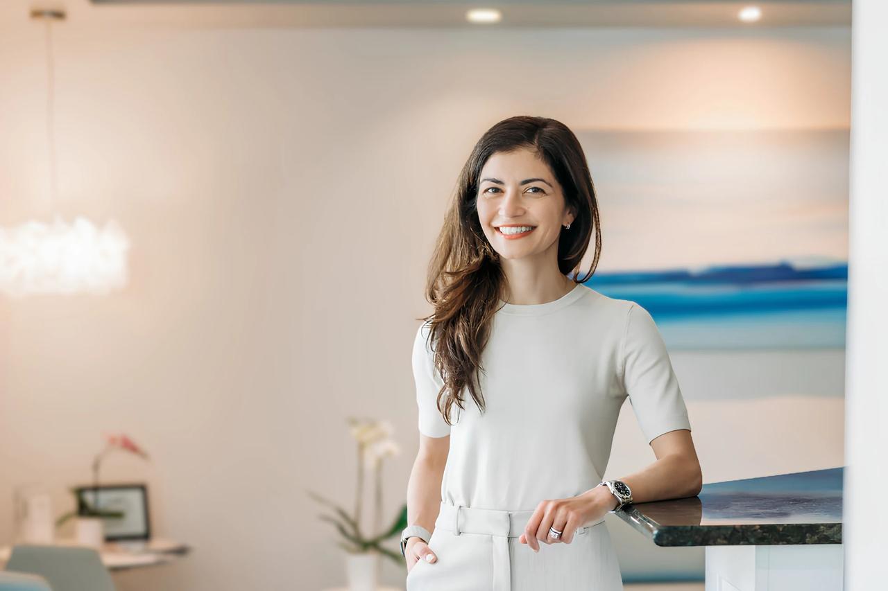 A Hingham Dentistry patient smiling in the practice's Hingham, MA office