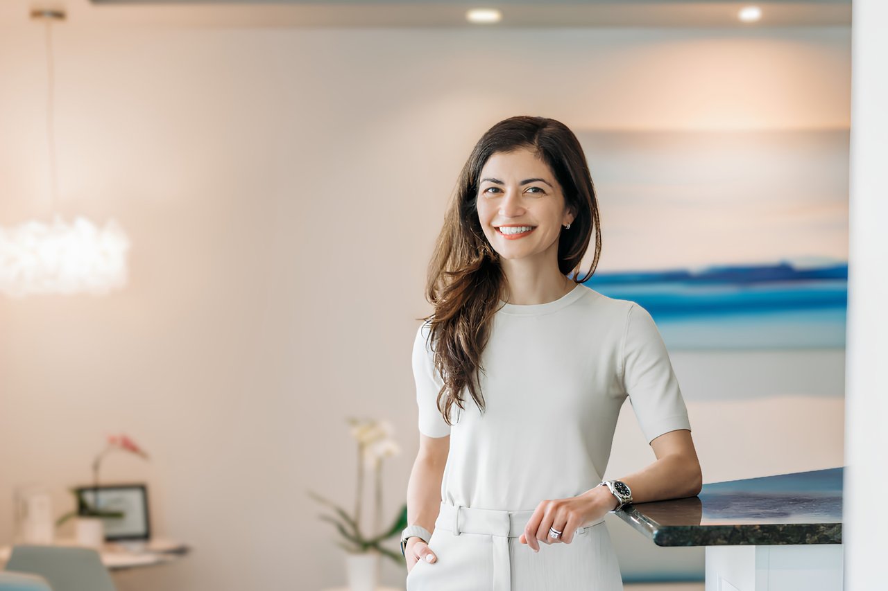 A Hingham Dentistry patient smiling in the practice's Hingham, MA office